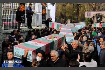 تشییع پیکر ۲۰۰ شهید گمنام دفاع مقدس در تهران 40