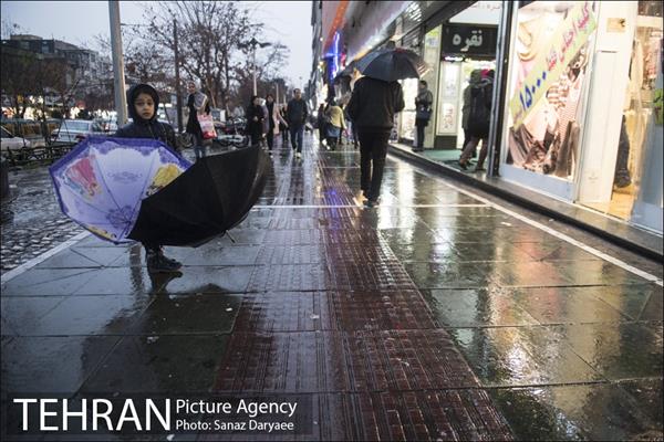 خیابان آیت در یک روز بارانی 18