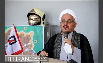 آیین پرچم گردانی حرم امام رضا در ایستگاه آتشنشانی 12