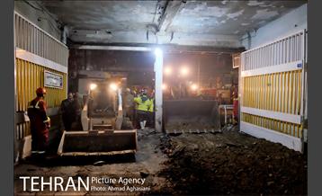 تلاش شبانه برای نجات آتش نشانان بازمانده در پلاسکو 12