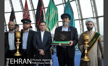 اهتزاز پرچم حرم حضرت معصومه (س) در برج میلاد 19