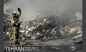 آتش سوزی انبار کالا در خیابان فداییان اسلام 7