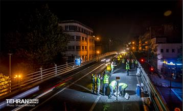 مرمت و بازسازی روکش پل تقاطع حافظ و طالقانی 26