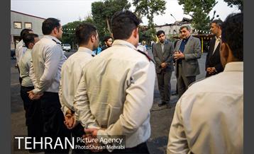 بازدید شهردار تهران از خسارت آتش سوزی اخیر میدان حسن آباد 35