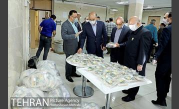 آماده سازی و توزیع 1000 پک افطاری در منطقه 6 10