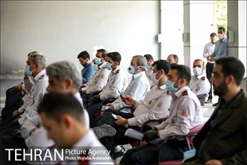 آیین پرچم گردانی حرم امام رضا در ایستگاه آتشنشانی 13