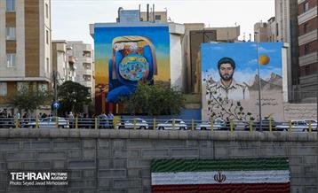 آیین رونمایی از دیوارنگاره «زنی که قدس را حمل می‌کند»  13