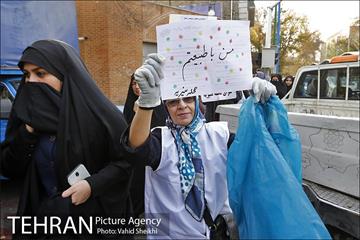 پاکسازی خیابان ولیعصر به مناسبت روز جهانی داوطلب 11