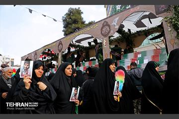 تشییع پیکر ۲۰۰ شهید گمنام دفاع مقدس در تهران 15