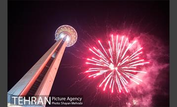 اهتزاز پرچم مسجد جمکران در برج میلاد 1