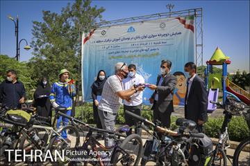 روز جهانی دوچرخه سواری با حضور توان یابان در بزرگترین بوستان ترافیک تهران 13