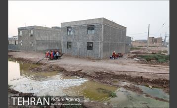 عملیات تخلیه آب از شهرک پیام اهواز 15