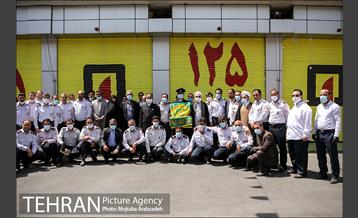 آیین پرچم گردانی حرم امام رضا در ایستگاه آتشنشانی 21