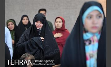 اهتزاز پرچم حرم حضرت معصومه (س) در برج میلاد 12