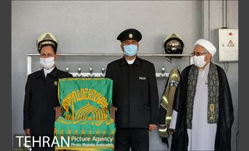 آیین پرچم گردانی حرم امام رضا در ایستگاه آتشنشانی 8