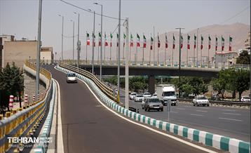 بهره‌برداری از تقاطع غیرهمسطح بزرگراه همت و اشرفی اصفهانی 37