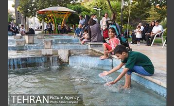 بعدازظهر تابستانی در میدان نبوت (هفت حوض) 14