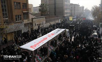 تشییع پیکر ۲۰۰ شهید گمنام دفاع مقدس در تهران 19