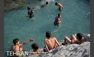 تابستان گرم  در چشمه علی 12