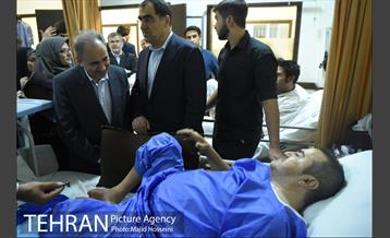 بازدید شهردار تهران و وزیر بهداشت از مراکز پزشکی و درمانی شهر 11