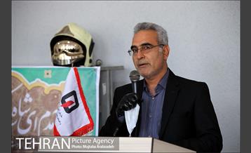 آیین پرچم گردانی حرم امام رضا در ایستگاه آتشنشانی 18