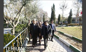 زیارت شهردار تهران از قبور شهدای دفاع مقدس 20