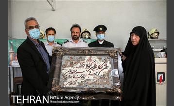 آیین پرچم گردانی حرم امام رضا در ایستگاه آتشنشانی 19