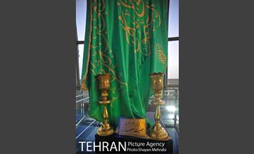 اهتزاز پرچم حرم حضرت معصومه (س) در برج میلاد 30