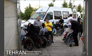 ضیافت افطار جمعی از معلول جسمی و حرکتی با شهردار تهران 18