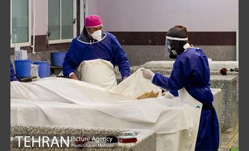 تطهیر و تدفین جانباختگان کرونایی در بهشت زهرا(س) 3