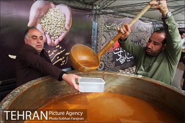 آیین سنتی " سمنوپزان" در میدان امام حسین (ع) 9