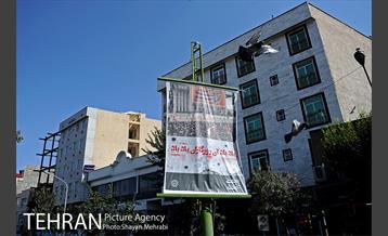 نصب تصاویر مربوط به دوران دفاع مقدس در معابر پایتخت 17