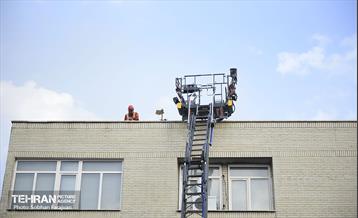 آتش سوزی در خیابان بهار تهران 76