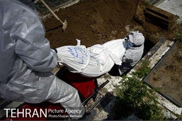 تطهیر و تدفین جانباختگان کرونایی در بهشت زهرا(س) 35