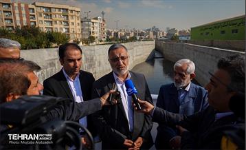 آیین بهره برداری از پنج پروژه جمع آوری و هدایت آب های سطحی در تهران  11