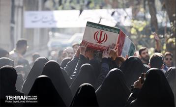 تشییع پیکرهای ۱۰۰ شهید گمنام از مقابل دانشگاه تهران 7