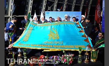 اهتزاز پرچم مسجد جمکران در برج میلاد 28