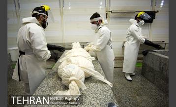 تطهیر و تدفین جانباختگان کرونایی در بهشت زهرا(س) 5