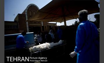 تطهیر و تدفین جانباختگان کرونایی در بهشت زهرا(س) 27