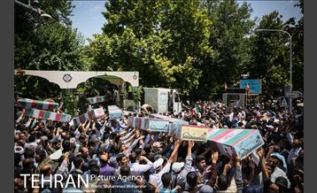 مراسم تشییع پیکرهای مطهر ۱۵۰ شهید تازه‌ تفحص‌ شده دفاع مقدس  - ۲ 31