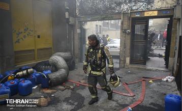 آتش سوزی در خیابان بهار تهران 58