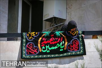 هرخانه، یک حسینیه، یک پرچم 19