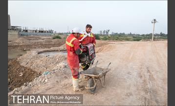 عملیات تخلیه آب از شهرک پیام اهواز 9