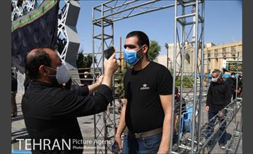 مراسم عزاداری ظهر عاشورا در میدان امام حسین(ع) 6