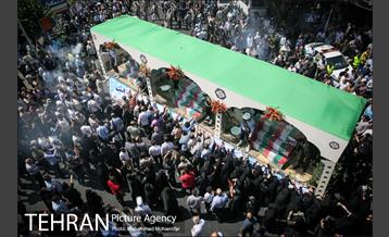 مراسم تشییع پیکرهای مطهر ۱۵۰ شهید تازه‌ تفحص‌ شده دفاع مقدس  - ۲ 14