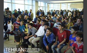 ‪ بازدید دکتر قالیباف از نمایشگاه برج میلاد و دیدار با کودکان کار‬ 11