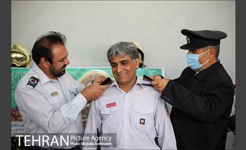 آیین پرچم گردانی حرم امام رضا در ایستگاه آتشنشانی 20