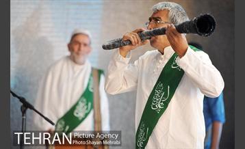 اهتزاز پرچم حرم حضرت معصومه (س) در برج میلاد 2