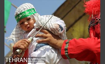 مراسم آتش زدن خیمه ها در ظهر عاشورا‎ 17