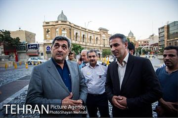 بازدید شهردار تهران از خسارت آتش سوزی اخیر میدان حسن آباد 16